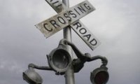 Train crossing in the rain