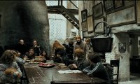 Harry and Hagrid have a meal at the Leaky Cauldron